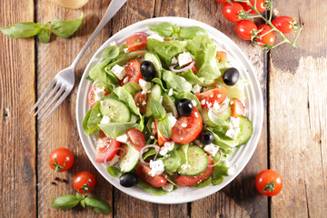 vegetable salad with tomato, cucumber, cheese and olive