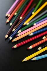 A pencil next to a book