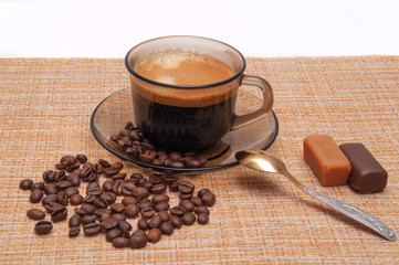 cup of espresso with sweets