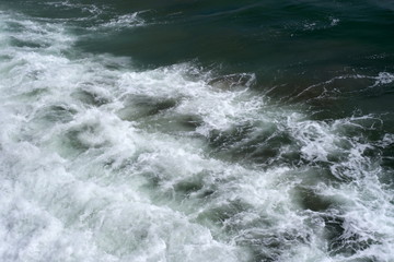 Fototapeta na wymiar The surface of the water in the Pacific Ocean. The waves. Background for web design.