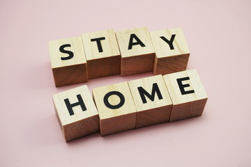 Stay Home alphabet letter on pink background