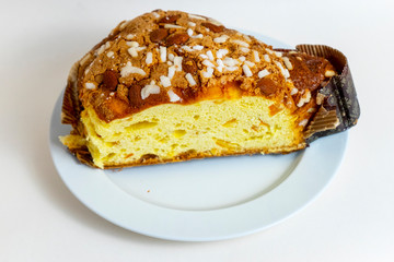 Panettone, Italian Christmas bread, with a brioche-like dough infused with a vanilla bean and studded with rum-soaked raisins and candied orange peel