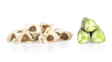 Moringa seeds and pods isolated on white background, herb and medical concept