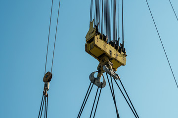 Crane block, with safe working load (SWL) of 3000 Short Ton (ST)  and auxiliary block of 30Ton of a derrick pipelay barge during lifting operations