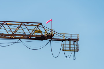 Pulley system on the back of port gantry crane with wind sock