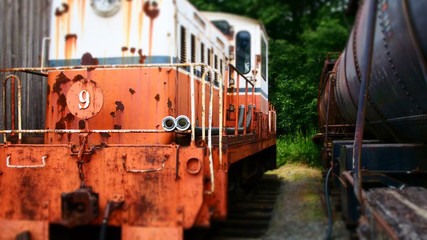 Abandoned Train Engines In A Yard
