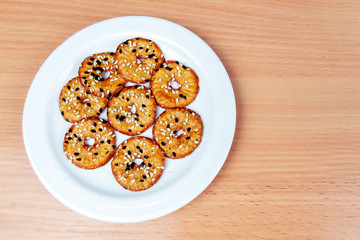 biscuit crackers with sesame seeds with space for text