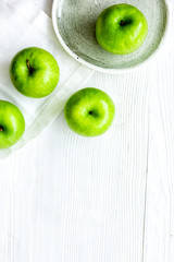 ripe green apples white table background top view space for text