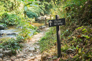 Path and signboard in Chaeson waterfall natural park of Lampang province, Thailand