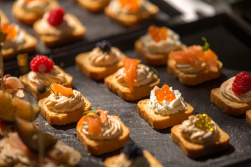 plate with delicious various finger food. luxury concept