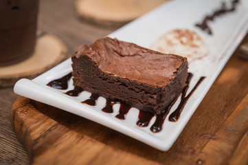chocolate cake on white dish closeup