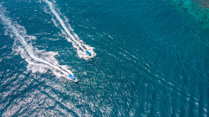 Obraz premium Aerial view of travel speed boat sailing between islands at Nha Trang Bay, Khanh Hoa, Vietnam