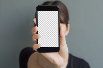 women hand holds and showing smartphone with blank transparent screen,women hiding behind...