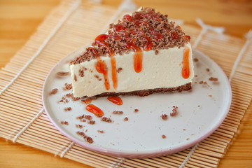 delicious cheesecake with strawberries on  plate