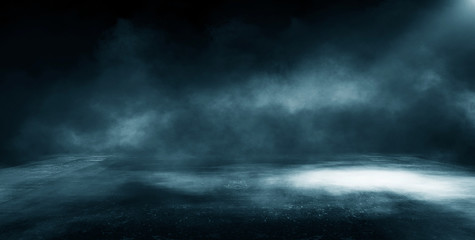 Dark street, wet asphalt, reflections of rays in the water. Abstract dark blue background, smoke, smog. Empty dark scene, neon light, spotlights. Concrete floor