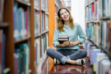 Happy young Asian University student.