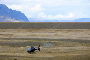 Obraz premium Jokulsarlon / Iceland - August 29, 2017: An helicopter near Glacier Lagoon, Iceland, Europe