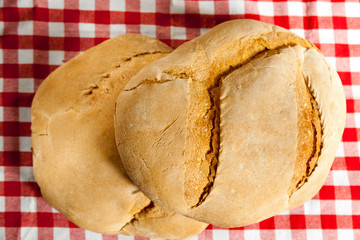 two loaves of rustic bread