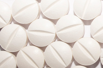 Piils background. Tablets. Medical background with pills and vitamins.