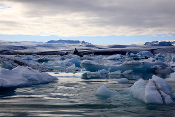 Jokulsarlon / Iceland - August 29, 2017: Ice formations and icebergs in Glacier Lagoon, Iceland,...