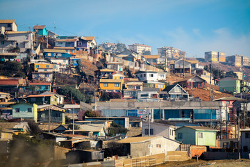 Fototapeta premium Valparaiso, Chile - March 08, 2020: Panaramic View to the Colorful Houses on the Chilean Hills