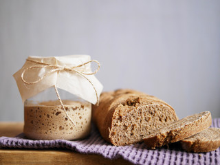 Homemade bread sourdough in a glass jar.