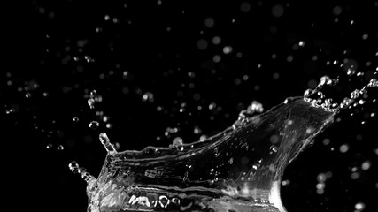 Water splash on black background