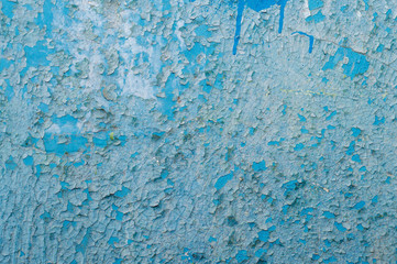 Old painted wall with cracked paint
