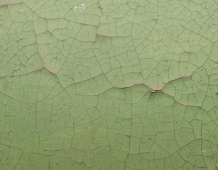 Old painted wall with cracked paint