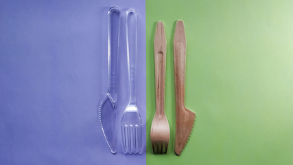 Contrast plastic and bamboo wooden fork knife. Eco-friendly disposable cutlery