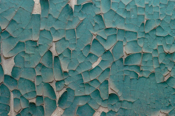 Old painted wall with cracked paint