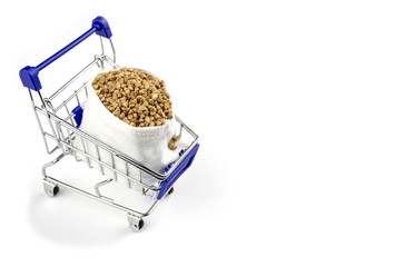 Cereal Buckwheat close up in shopping cart as shopping concept with copy space
