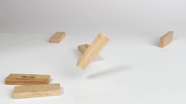 Jenga Blocks falling in Slow Motion on a hard surface