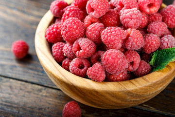 ripe raspberries in a plate
