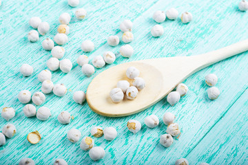 dry chickpeas in a spoon on the table
