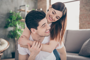 Close-up portrait of nice attractive lovely cute gentle affectionate cheerful cheery couple sitting...