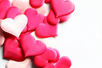 Background of red and pink hearts - Symbols of love closeup macro view