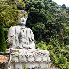 Big Stone buddha which is located at Chin Swee Caves Temple,Genting Highlands. People can see...