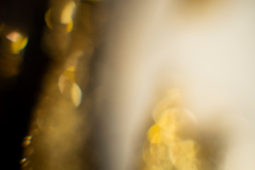 Abstract golden background with bokeh. holidays lights on background