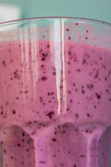 Berry smoothies in a glass: a healthy diet drink.