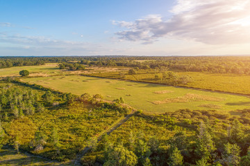 Sun shining on farmland in Australia - aerial view