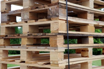 Wooden pallet overlap on warehouse yard