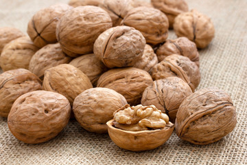 Fresh and organic walnuts on burlap