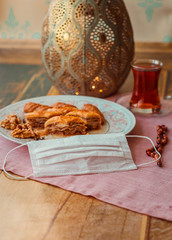 Turkish sweets baklava, kalburabasti and tea on ramadan