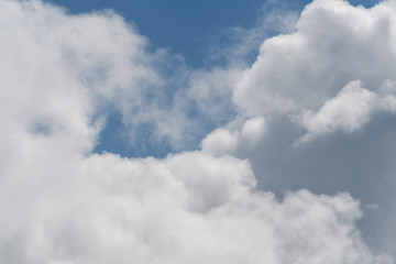 storm clouds gather in the blue sky