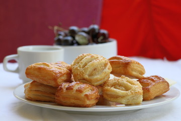 Sweet rolls with sesame on the table