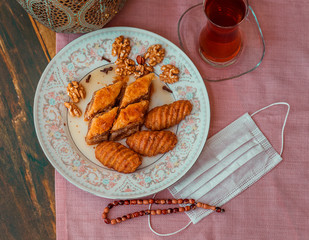 Turkish sweets baklava, kalburabasti and tea on ramadan