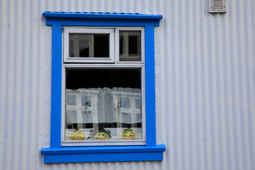 Seydisfjordur / Iceland - August 29, 2017: A wooden window in Seydisfjordur village, Iceland, Europe