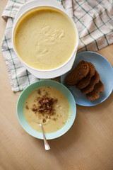 plate of mashed potato soup with bread