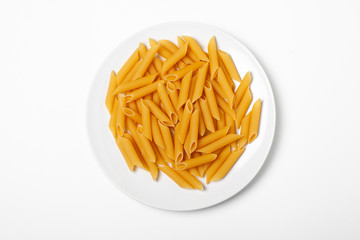 Penne pasta on white plate isolated on white background.